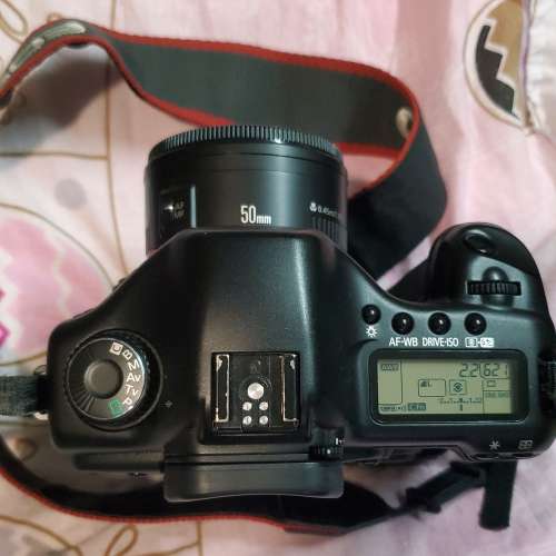 Canon EOS 5D body + BG-E4 grip + EF 50mm f/1.8 II lens
