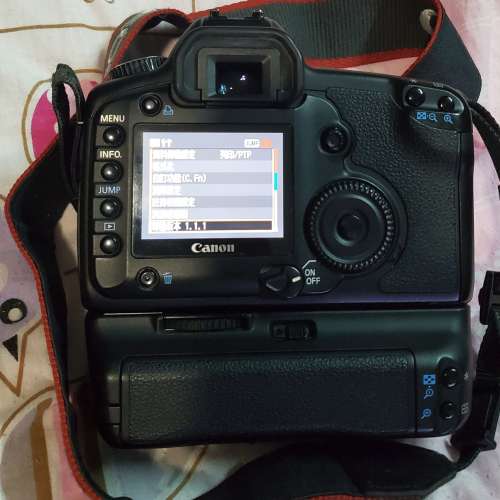 Canon EOS 5D body + BG-E4 grip + EF 50mm f/1.8 II lens
