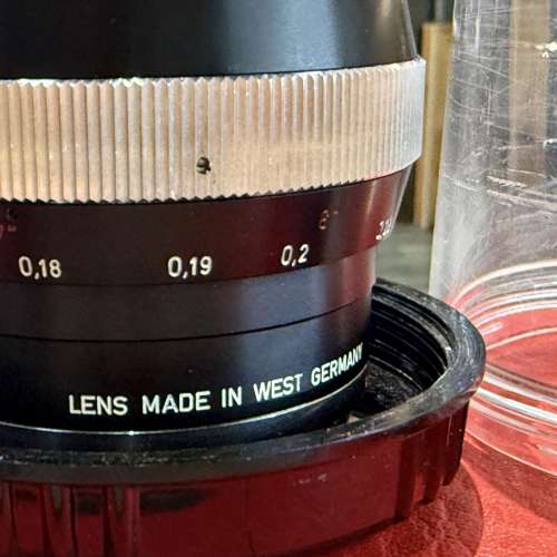 Contarex Zeiss Distagon 25mm f2.8 black lens with matching bubble case/ adapter