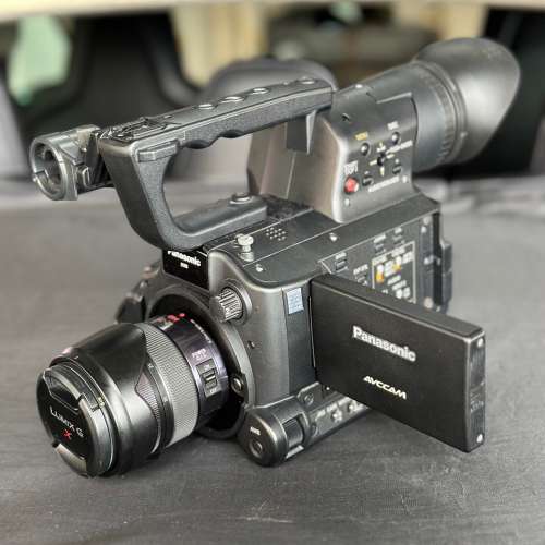 Panasonic AF100 + Lumix