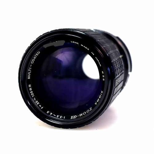推前105mm拉闊35mm焦点不变.全程微距鏡. pentax 接口全金属玻璃製.不合只会全自動的...