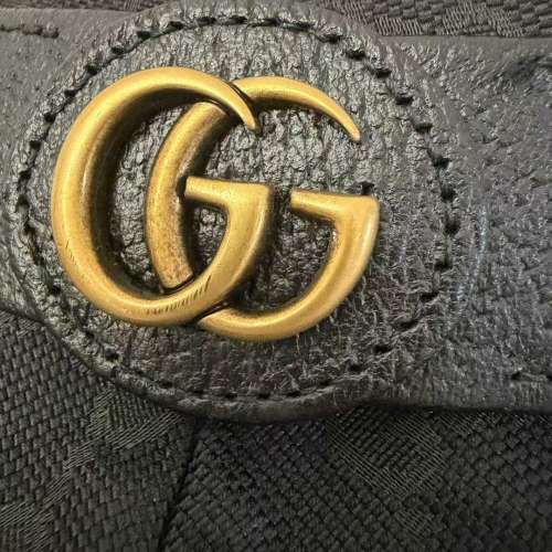 Gucci 的黑色GG Canvas Bucket Hat