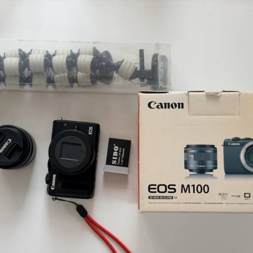 canon m100 + 22mm + 15-35 kit lens