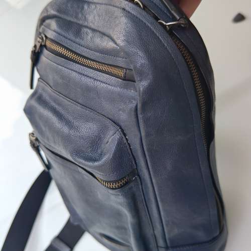 Tumi leather sling bag