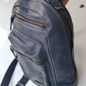 Tumi leather sling bag