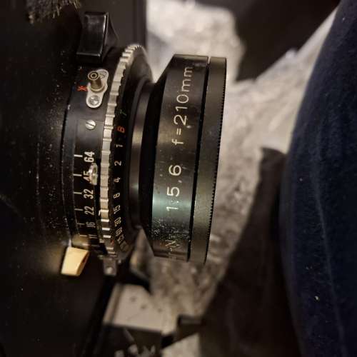 210 / 5.6