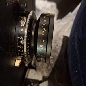 210 / 5.6