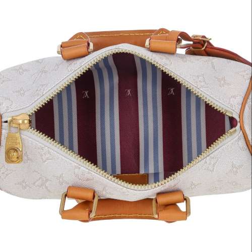 Louis Vuitton Monogram Embossed Vachetta Heritage Keepall Bandouliere 25