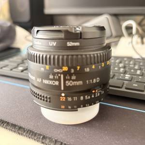 Nikon AF Nikkor 50mm f/1.8D (with a Kenko 52mm UV filter attached)