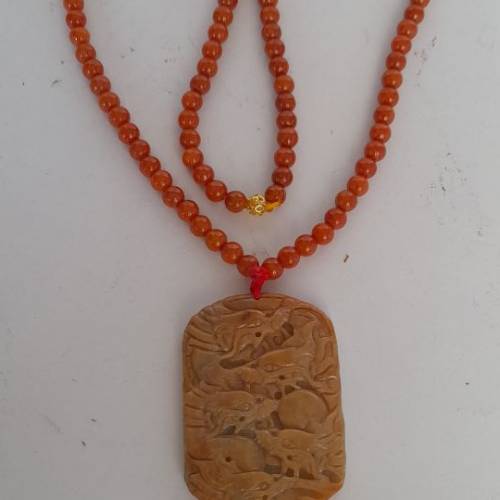 半價清貨。紅翡A玉龍牌，55x40x6mm，雙面雕刻共九龍，配上紅翡頸鏈6mm26寸，原價一...