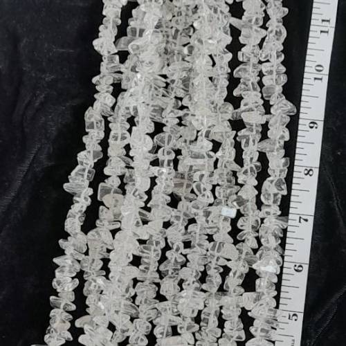 一手十條天然A級隨形水晶珠串，約16寸如照片，清貨共售三百元。no.R21.7.26