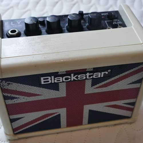 Blackstar mini guitar practice amp.